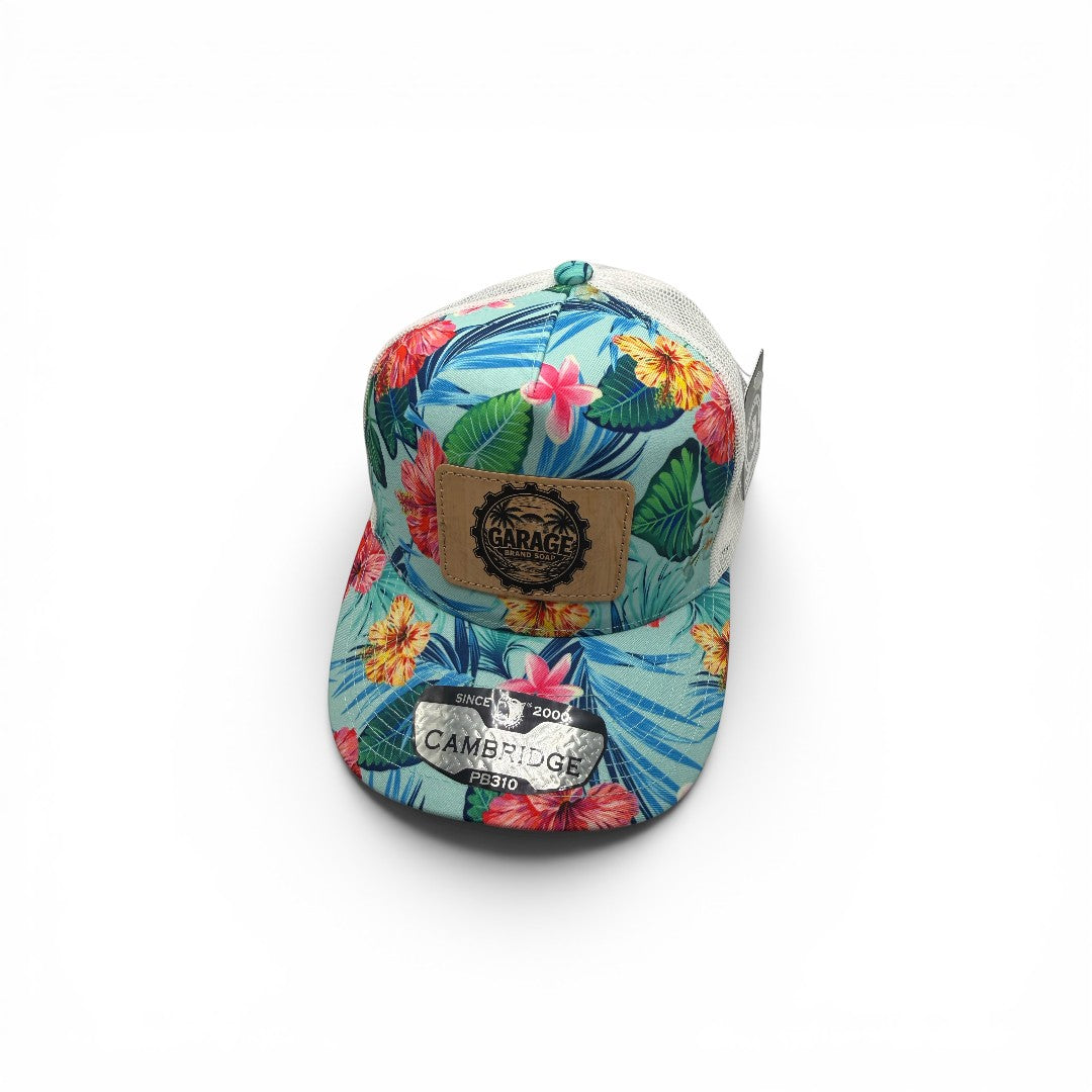 Garage Brand Soap tropical floral print trucker hat with a leather logo patch and white mesh back